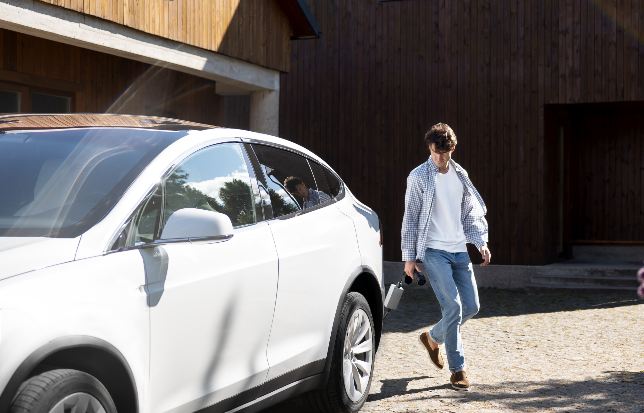 Residential villa garage with installed charger from EV Charger Suppliers Dubai.