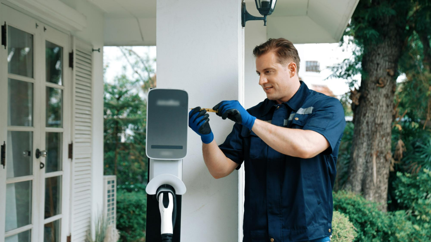 Technician performing Home EV Charger Installation Dubai